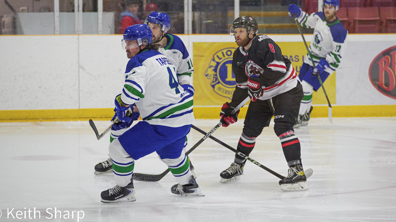 Wood surrounded by Saints players