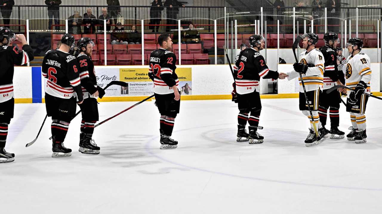McCoys shake hands with the Tigers following Game Three loss