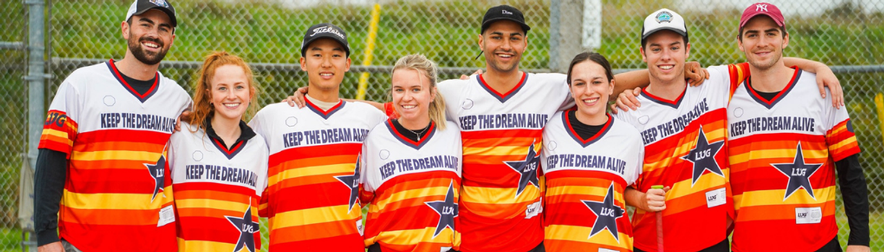 Coed LUG fall softball team wearing custom red, orange and white jerseys