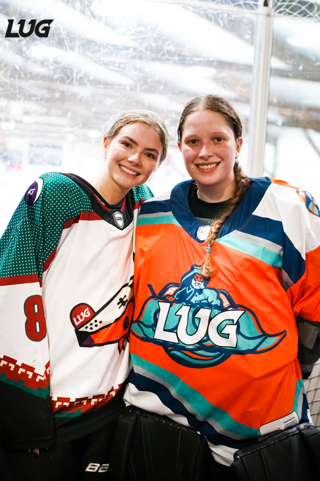 LUG women's hockey players celebrating league achievements