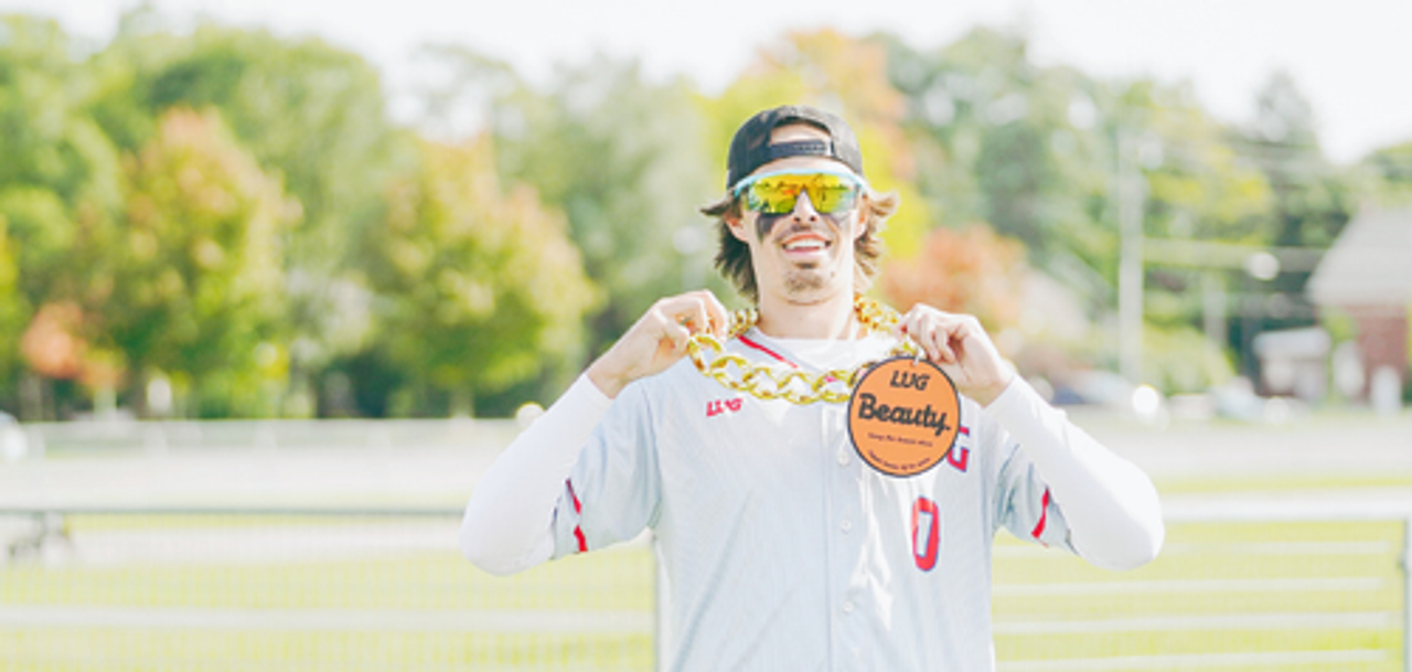 LUG player showing his team identity and player award