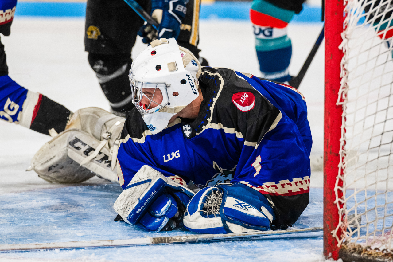 LUG hockey goalie making a save during league play