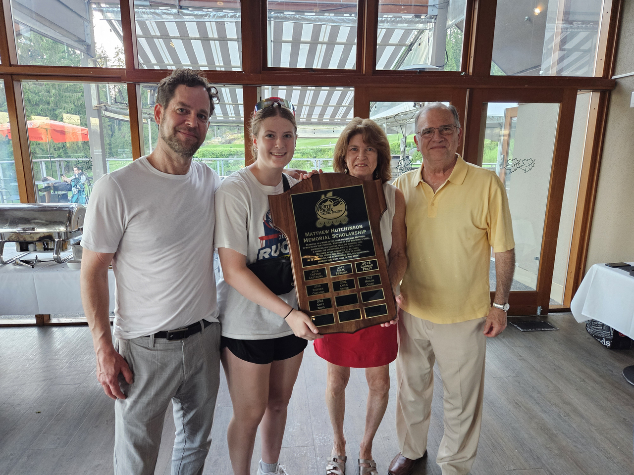 Emily Davis accepting 2024 Matthew Hutchinson Memorial Scholarship