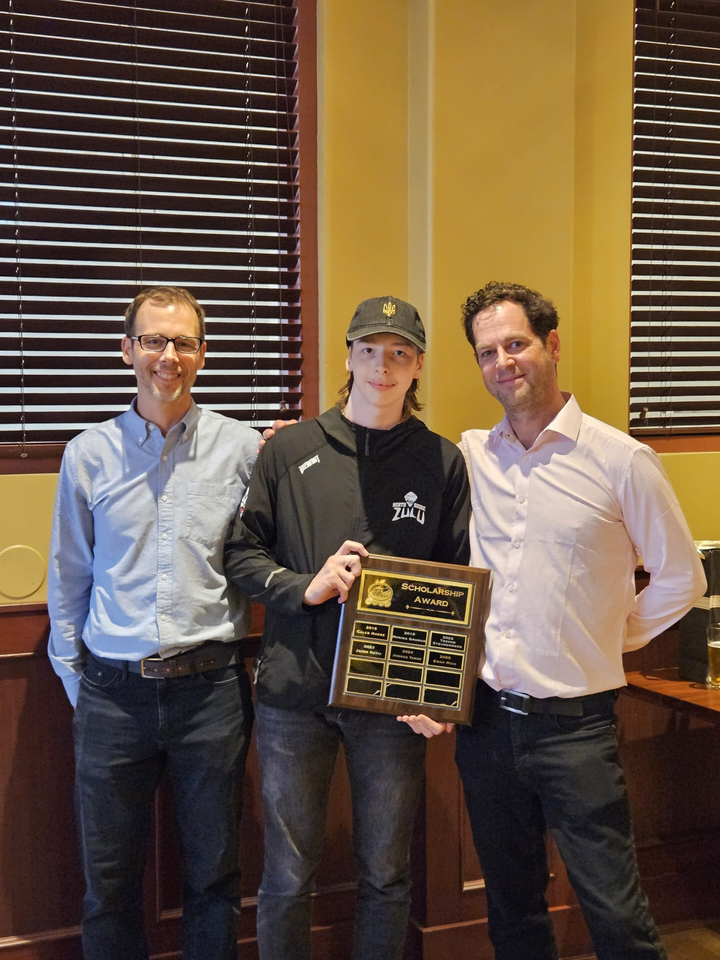 Ewan Mick receives the 2025 NSIHL Scholarship, presented by John Bear (right)