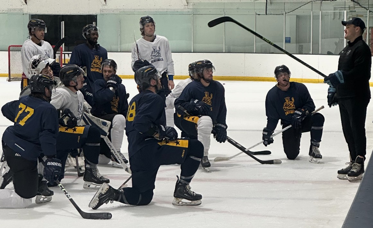 Coach Thompson addresses the team for the first time.