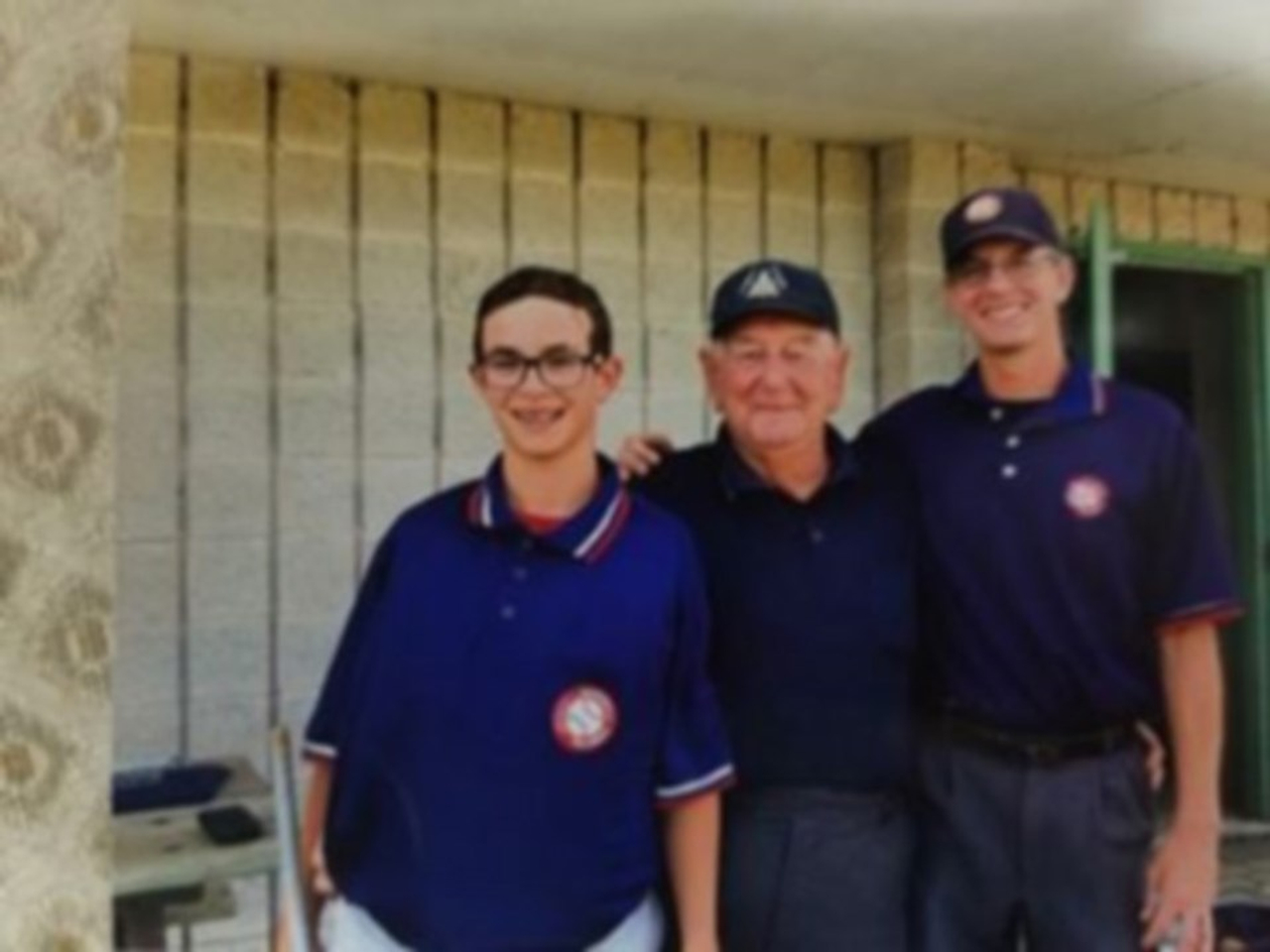Walter H pictured at the field with his son and grandson