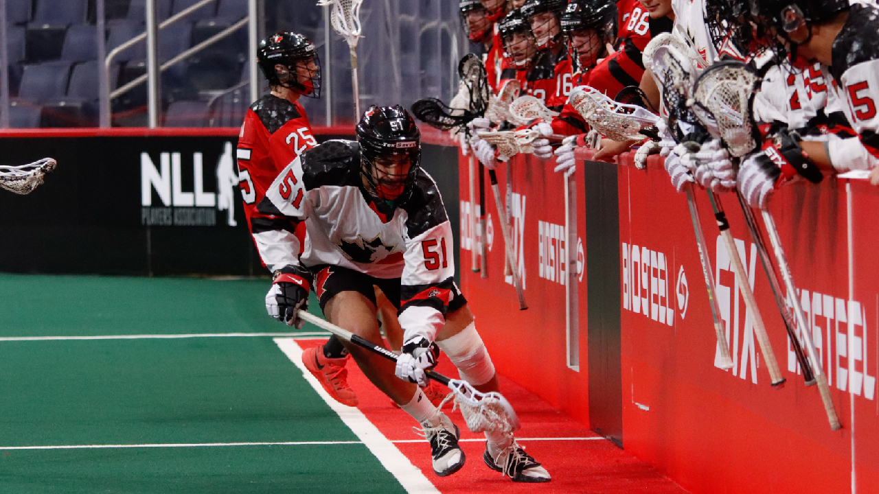 Brenden Boyle grabbing a loose ball at the 2021 IIJL World Junior Lacrosse Championship