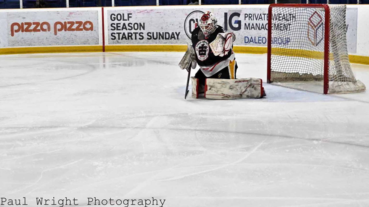 Mole making a glove save on a long range shot