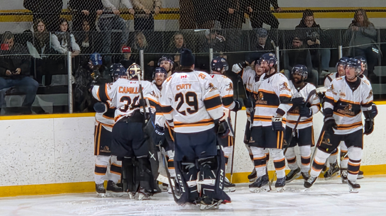 Gryphins celebrate OT win over Stoney Creek