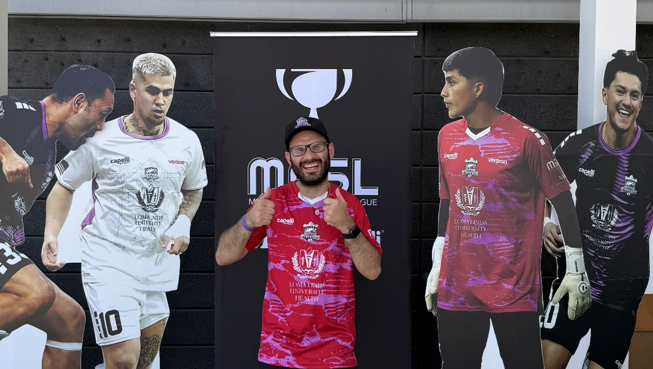 Tyler Bateman with Empire Strykers players cut outs