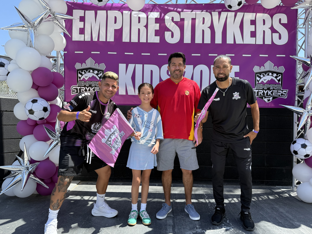 Empire Strykers players with some fans