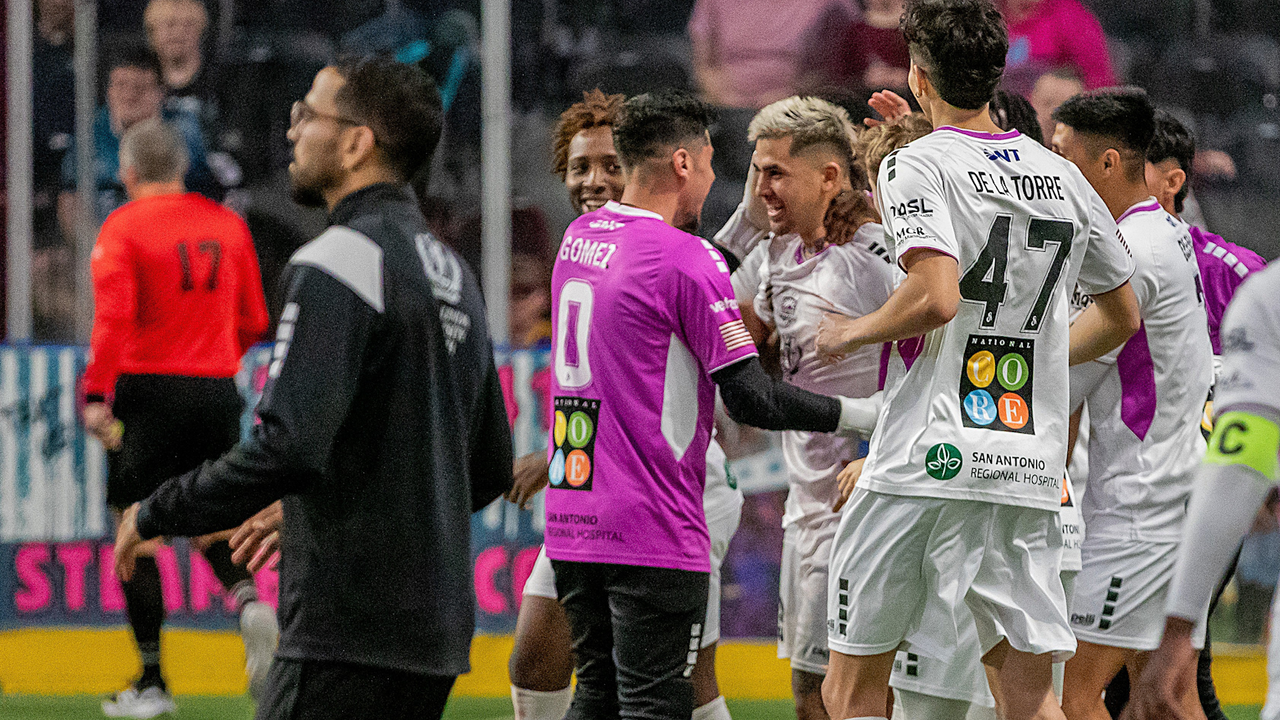 Photo of Justin Stinson celebrating with the team