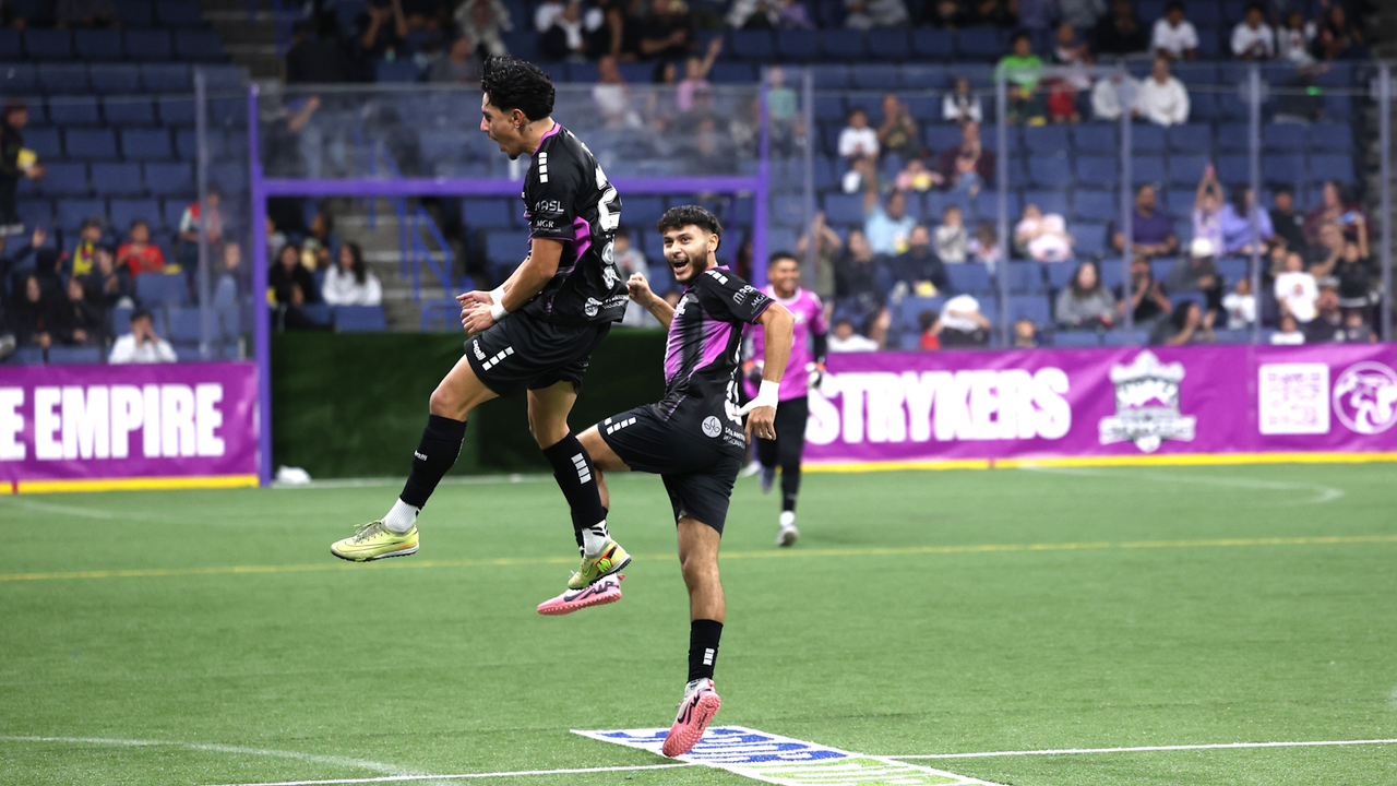 Photo of Polo Hernandez celebrating with Strykers teammate Alan Perez