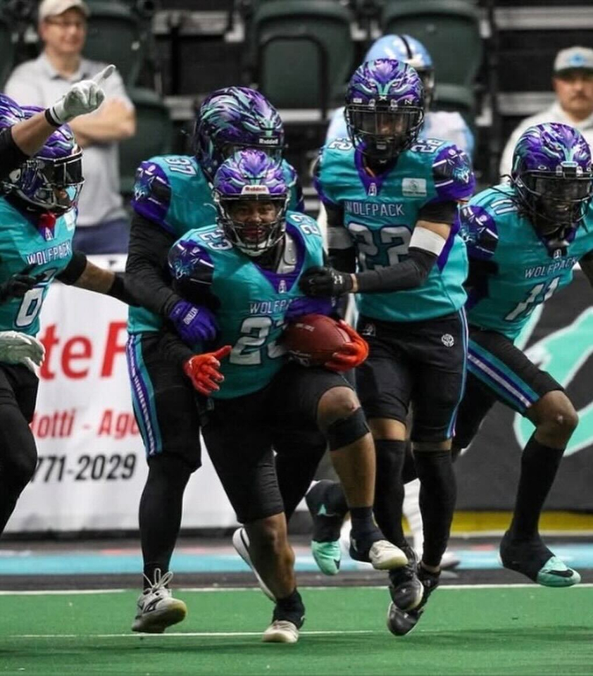 Wolfpack Defensive Back Jadarius Byrd celebrates with teammates after a big play