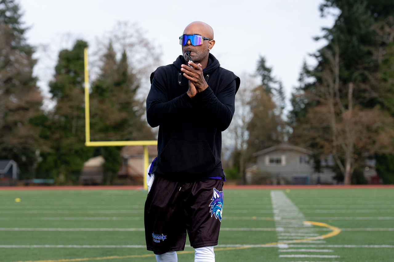 Defensive Coordinator Dee Milly Blows the Whistle During Training Camp