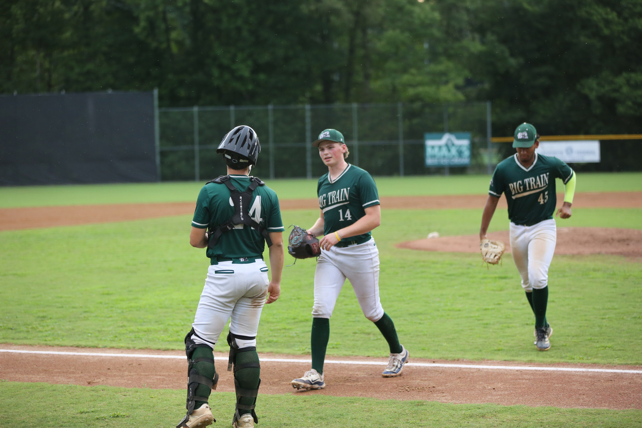 Emilio Gonzalez (#45), JJ Hand (#24) and Russell Petersen (#14) by Mark Thalman