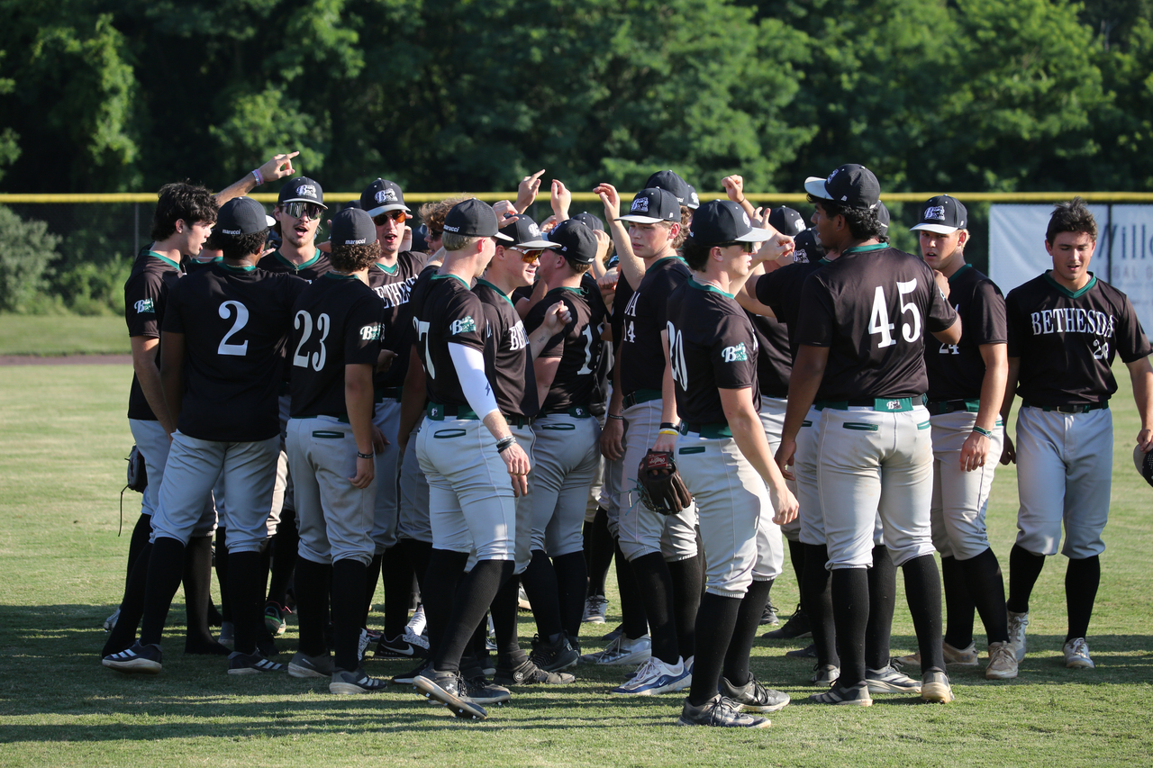 Pregame Huddle by Mark Thalman