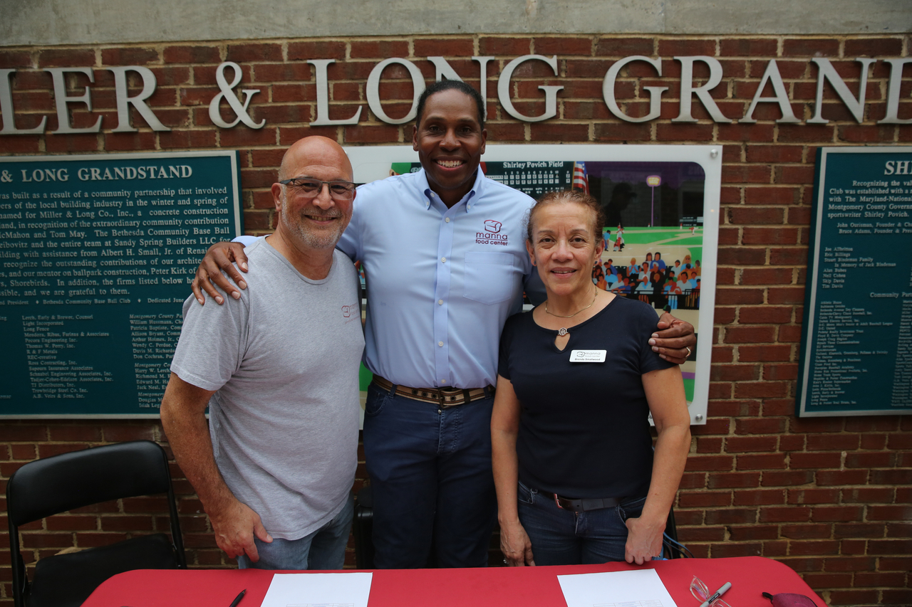 Craig Rice (middle) and Manna Food Center by Mark Thalman