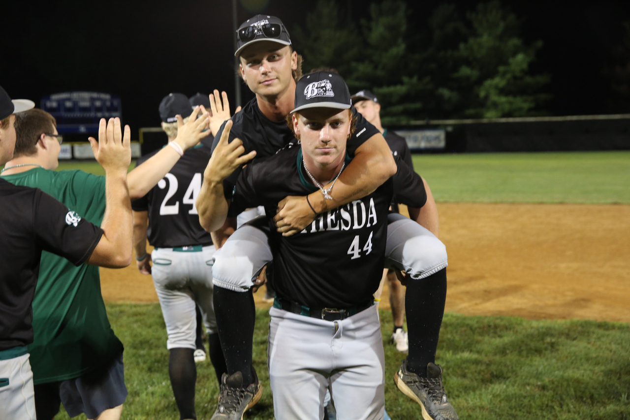 Connor Lehman giving a piggy-back ride by Mark Thalman